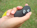 Operator holding tailgate remote